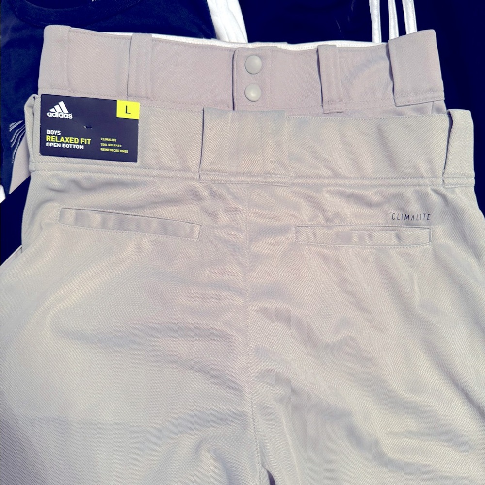 2 pair of Adidas baseball pants, size YL. Price is per pair 20x2 or best offer.